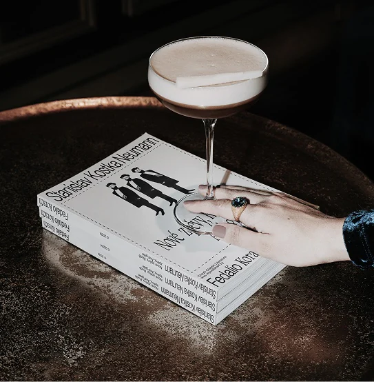 Book cover with a cocktail glass on top
