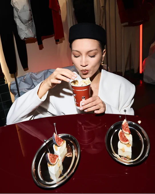 Guest with popcorn and desserts