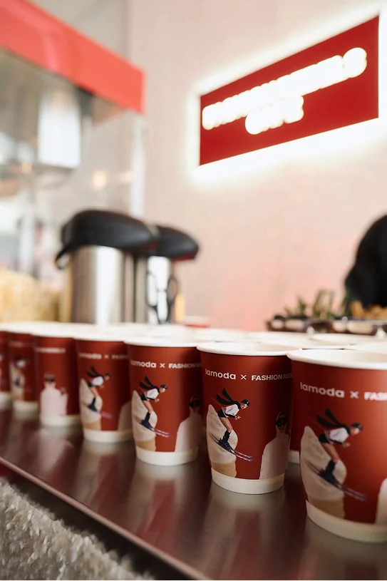 Branded cups at the cafe counter