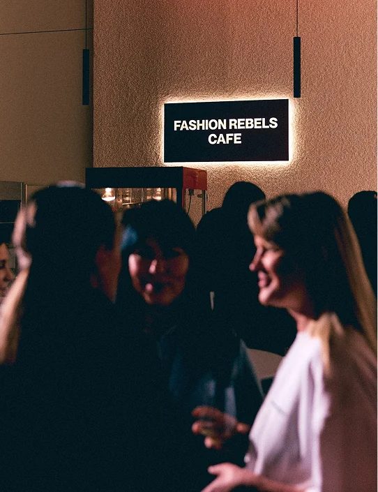 Fashion Rebels Cafe sign above the guests